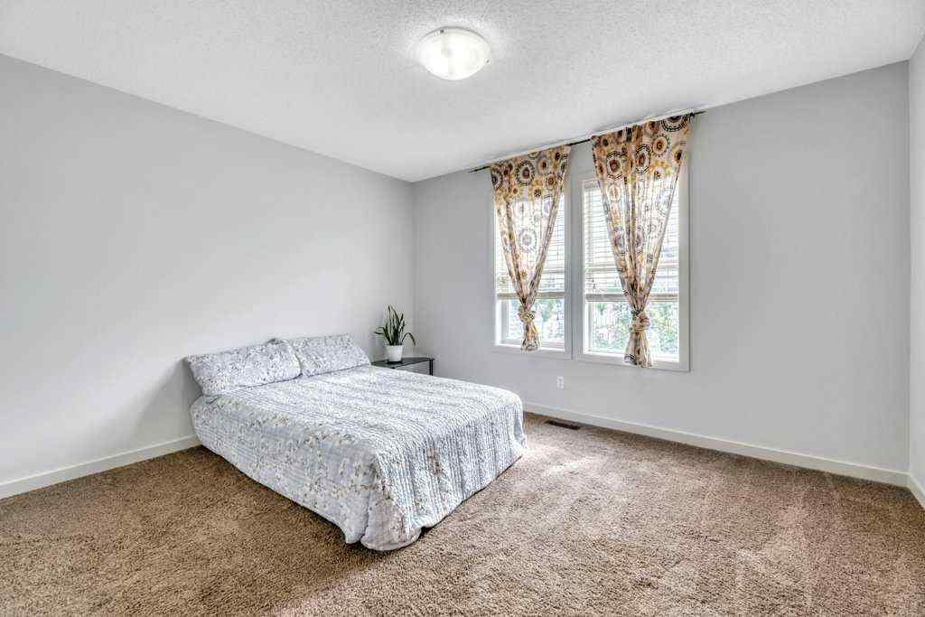 MLS® A2258026 - 4040 New Brighton Grove SE in New Brighton Calgary, Residential