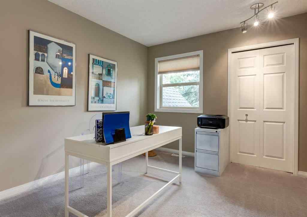 MLS® A2258036 - 187 Strathaven Circle SW in Strathcona Park Calgary, Residential