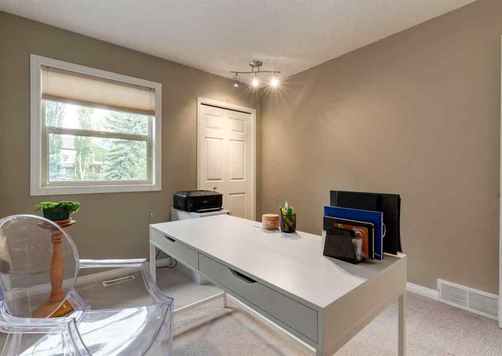 MLS® A2258036 - 187 Strathaven Circle SW in Strathcona Park Calgary, Residential
