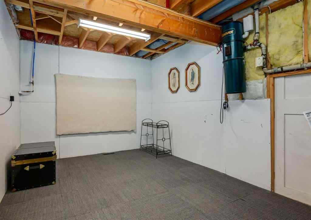 MLS® A2258036 - 187 Strathaven Circle SW in Strathcona Park Calgary, Residential