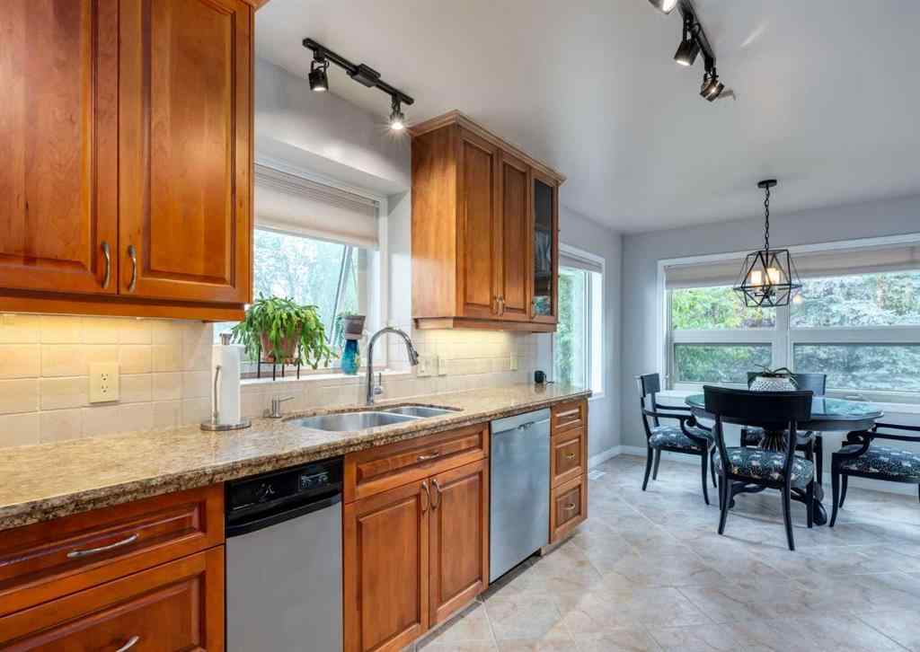 MLS® A2258036 - 187 Strathaven Circle SW in Strathcona Park Calgary, Residential