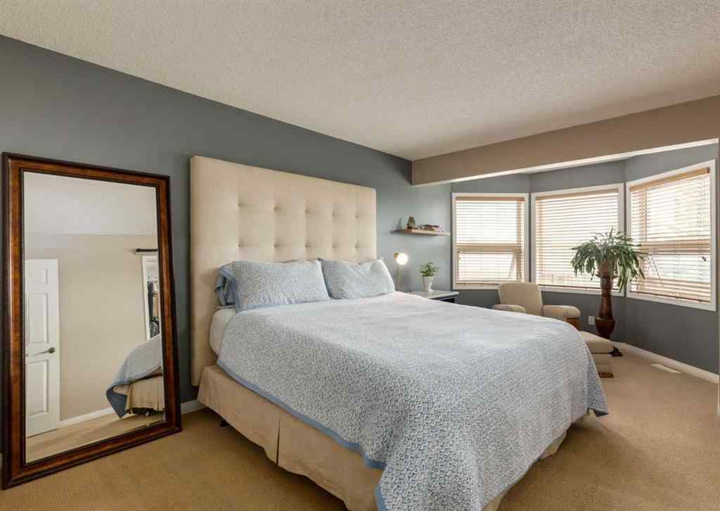 MLS® A2258036 - 187 Strathaven Circle SW in Strathcona Park Calgary, Residential