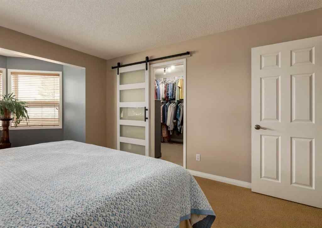 MLS® A2258036 - 187 Strathaven Circle SW in Strathcona Park Calgary, Residential
