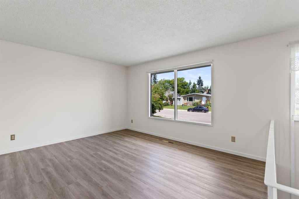 MLS® A2258043 - 18 Harmon Place SW in Haysboro Calgary, Residential