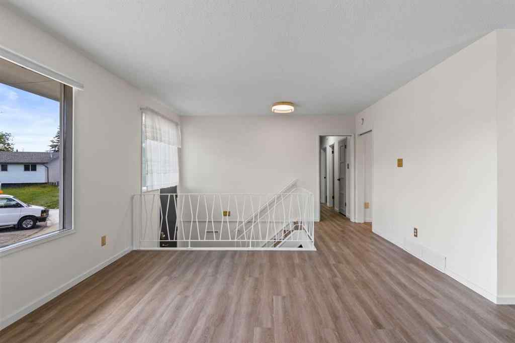 MLS® A2258043 - 18 Harmon Place SW in Haysboro Calgary, Residential