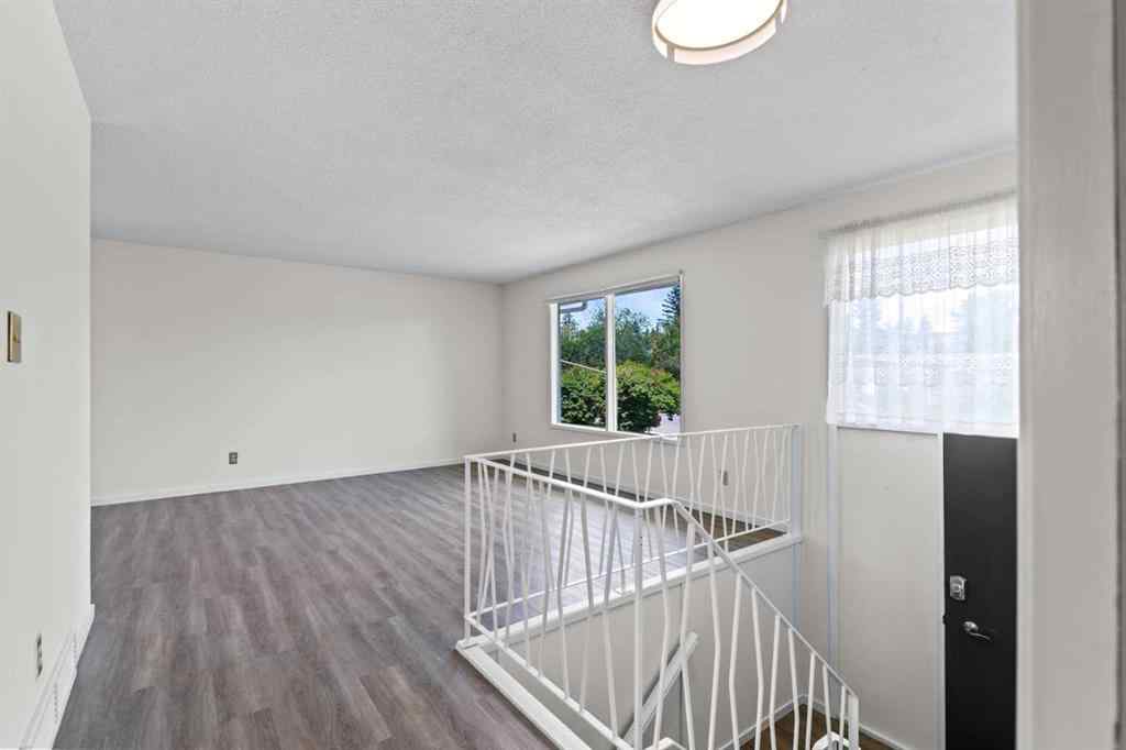 MLS® A2258043 - 18 Harmon Place SW in Haysboro Calgary, Residential