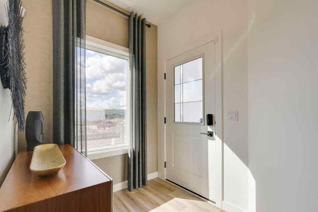 MLS® A2258052 - 87 Creekstone Common SW in Pine Creek Calgary, Residential