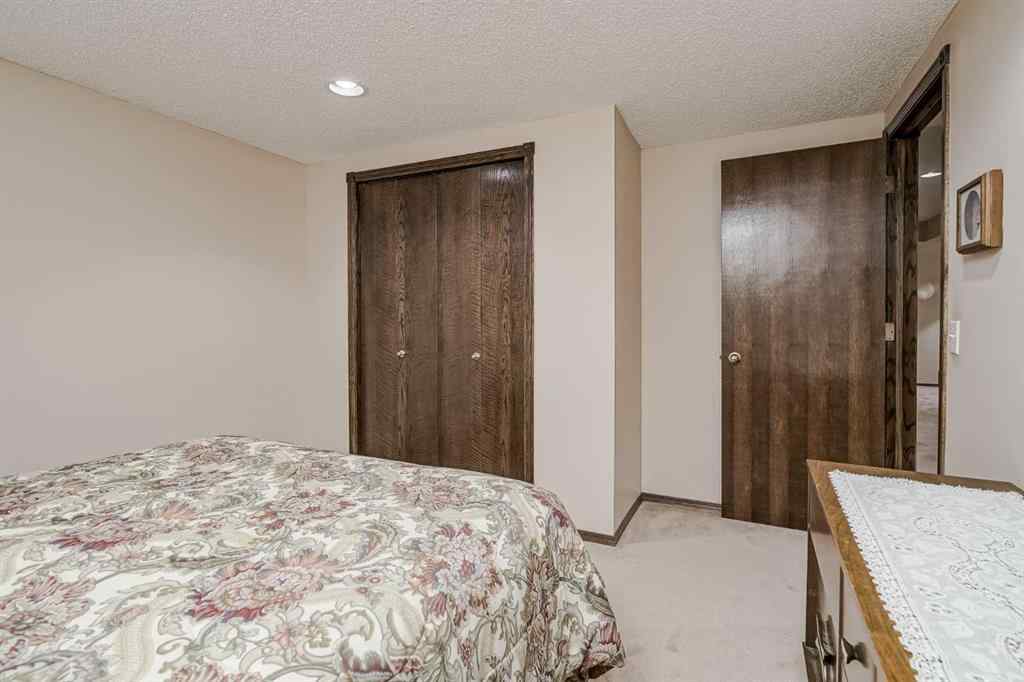 MLS® A2258054 - 14319 Evergreen Street SW in Evergreen Calgary, Residential