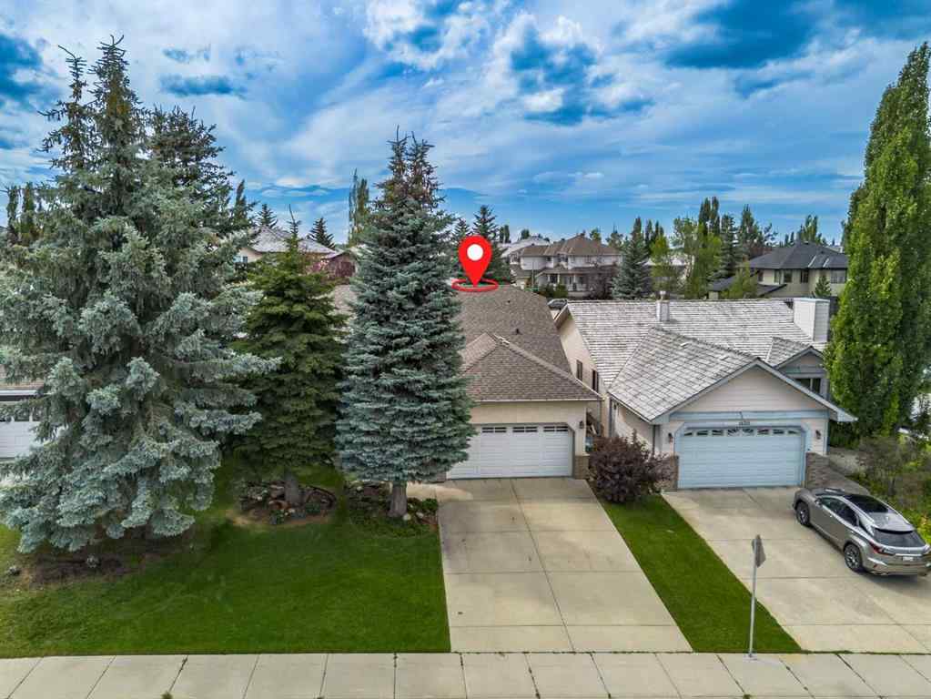 MLS® A2258054 - 14319 Evergreen Street SW in Evergreen Calgary, Residential