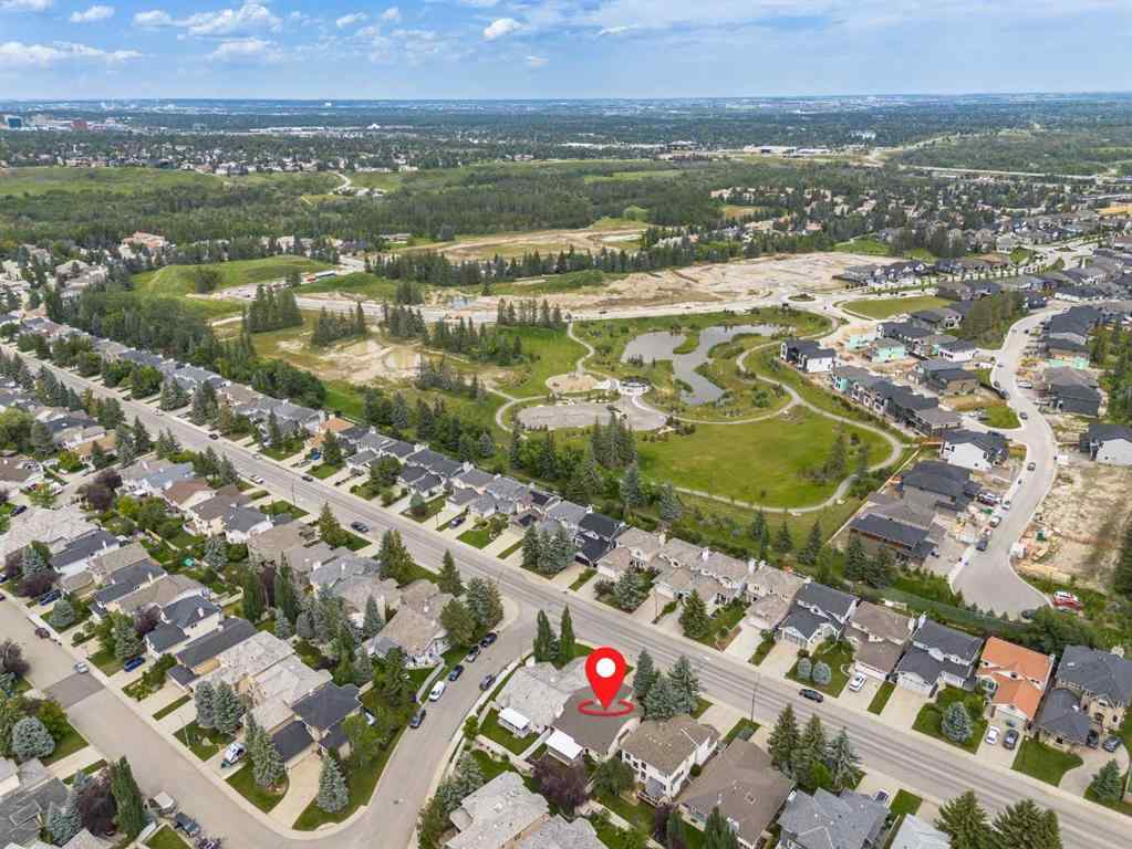 MLS® A2258054 - 14319 Evergreen Street SW in Evergreen Calgary, Residential