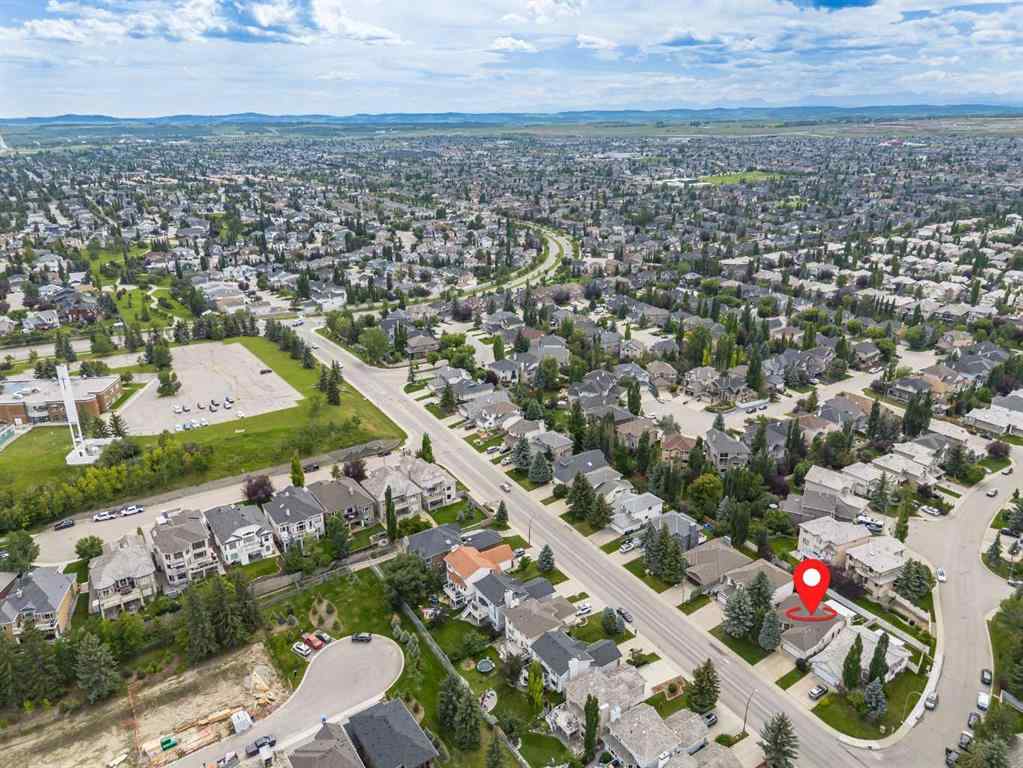 MLS® A2258054 - 14319 Evergreen Street SW in Evergreen Calgary, Residential