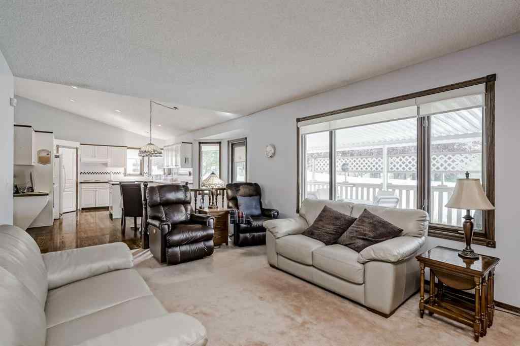 MLS® A2258054 - 14319 Evergreen Street SW in Evergreen Calgary, Residential