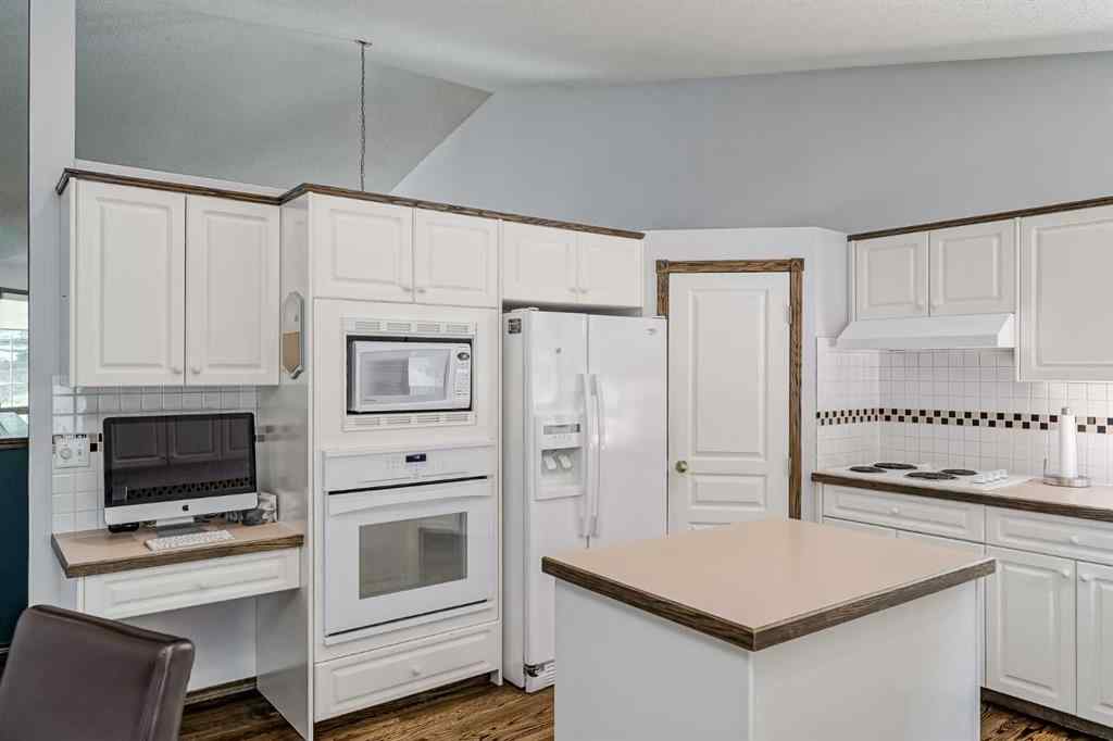 MLS® A2258054 - 14319 Evergreen Street SW in Evergreen Calgary, Residential