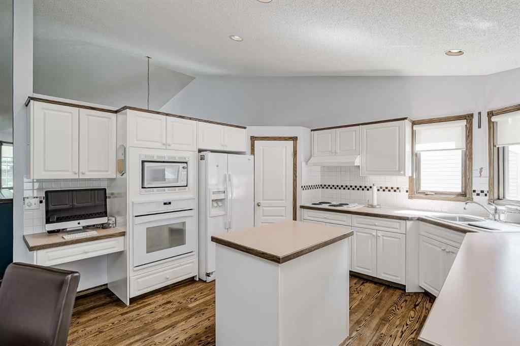 MLS® A2258054 - 14319 Evergreen Street SW in Evergreen Calgary, Residential