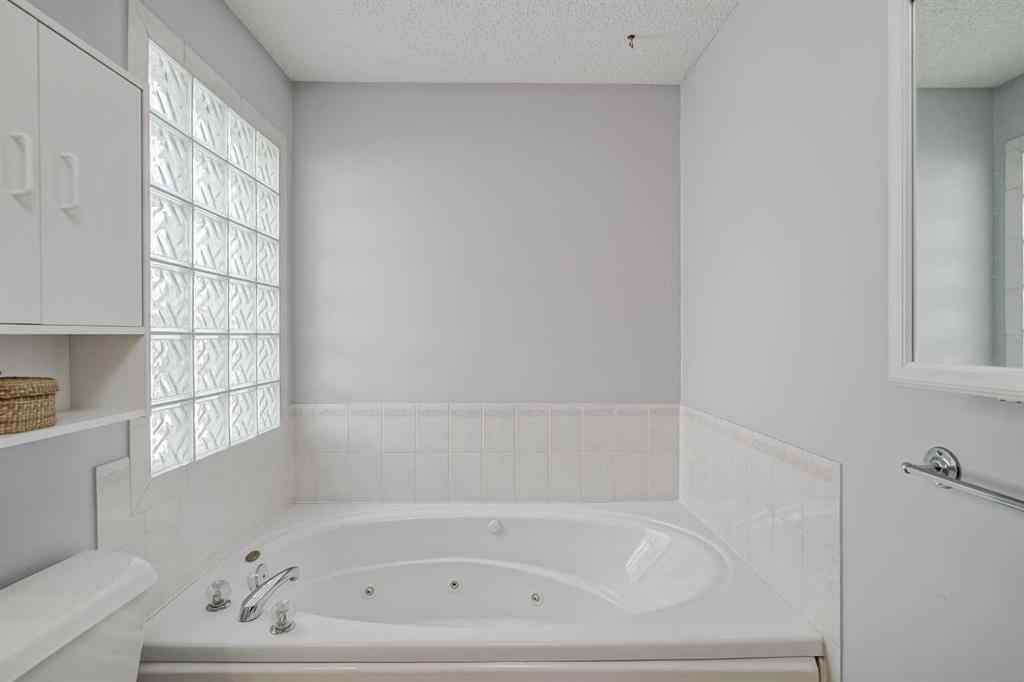 MLS® A2258054 - 14319 Evergreen Street SW in Evergreen Calgary, Residential