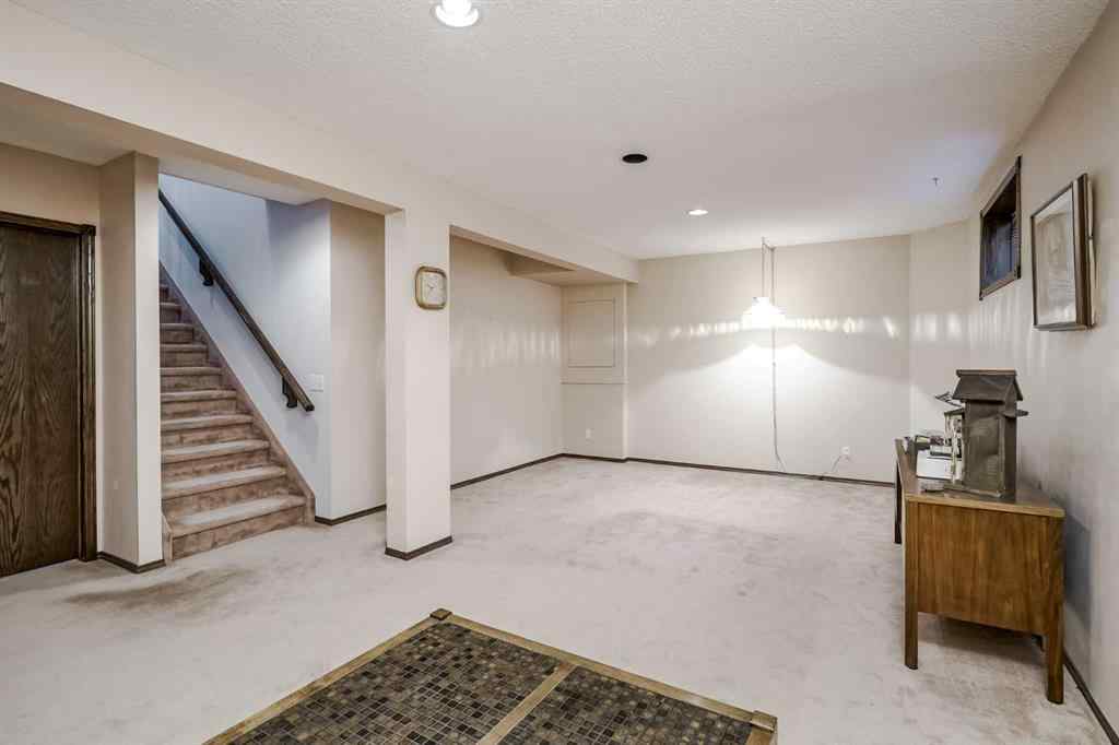 MLS® A2258054 - 14319 Evergreen Street SW in Evergreen Calgary, Residential