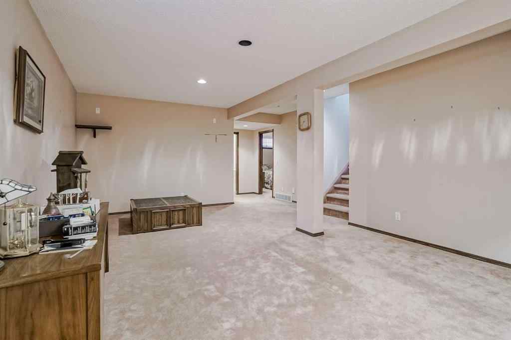 MLS® A2258054 - 14319 Evergreen Street SW in Evergreen Calgary, Residential
