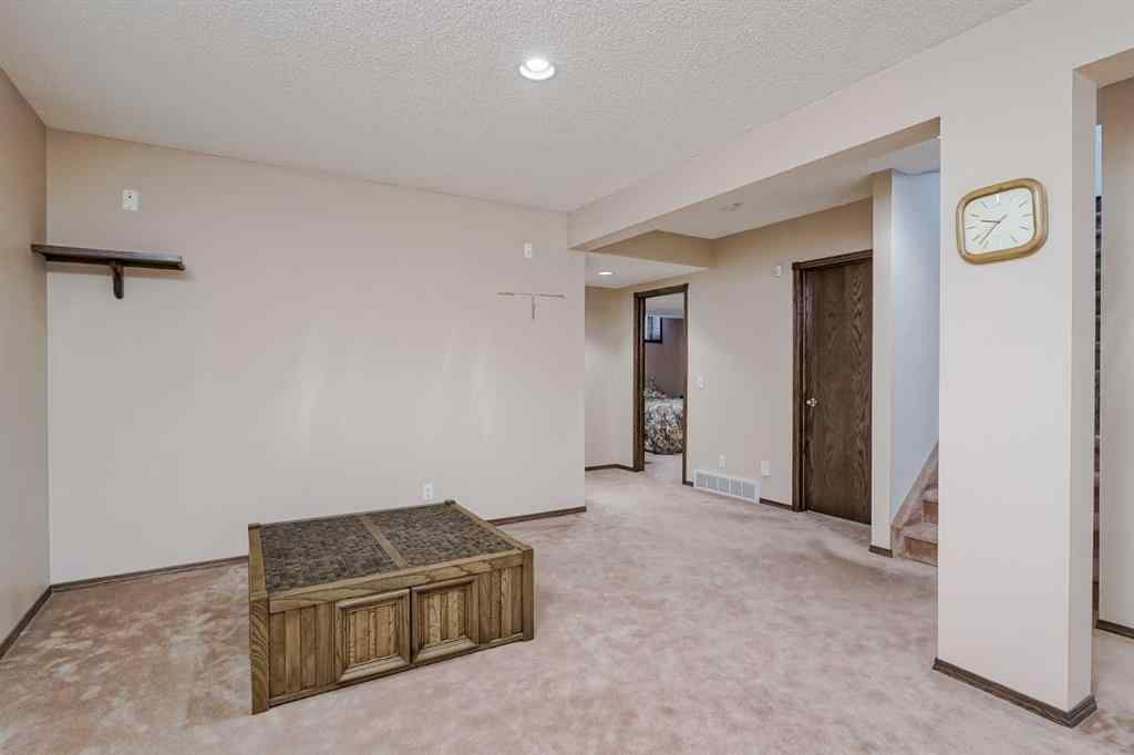 MLS® A2258054 - 14319 Evergreen Street SW in Evergreen Calgary, Residential