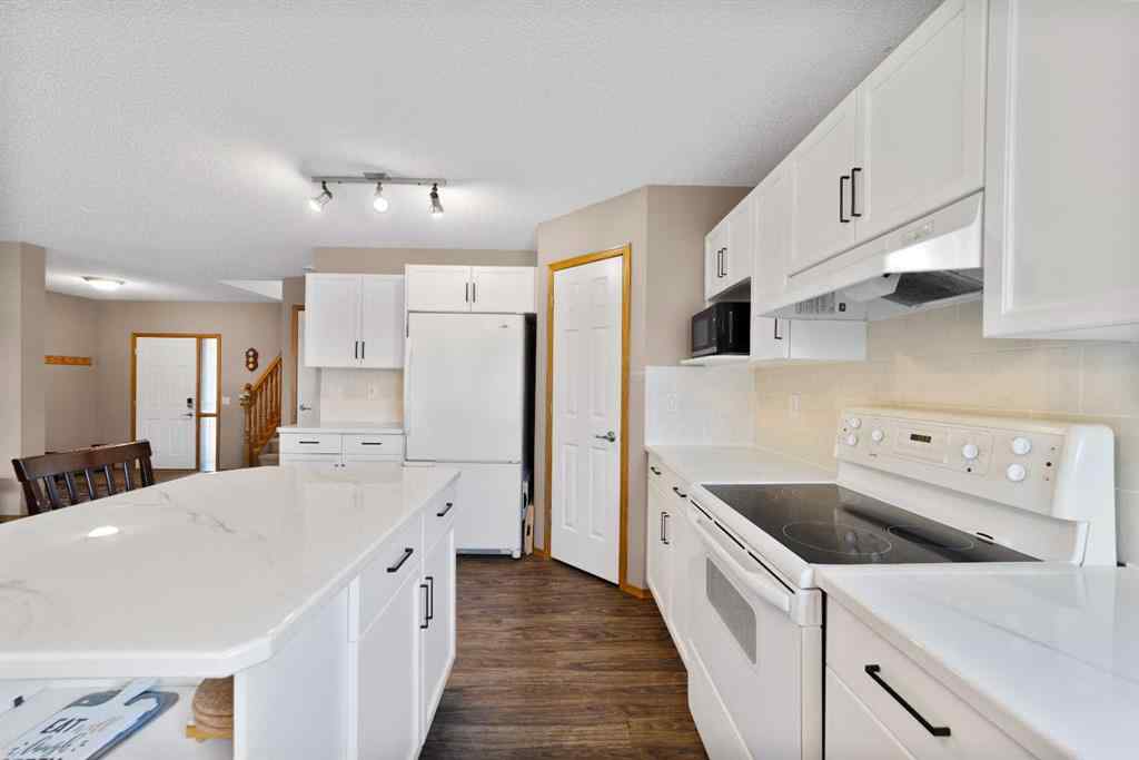 MLS® A2258063 - 424 Stonegate Road NW in Stonegate Airdrie, Residential