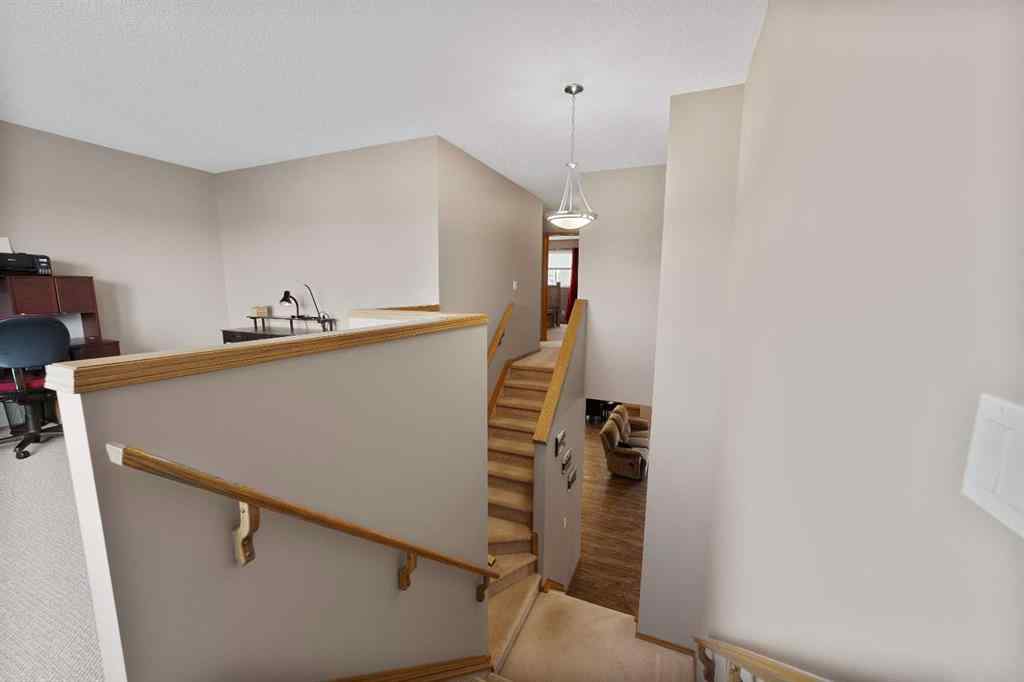 MLS® A2258063 - 424 Stonegate Road NW in Stonegate Airdrie, Residential