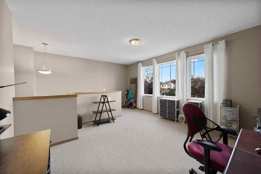 MLS® A2258063 - 424 Stonegate Road NW in Stonegate Airdrie, Residential