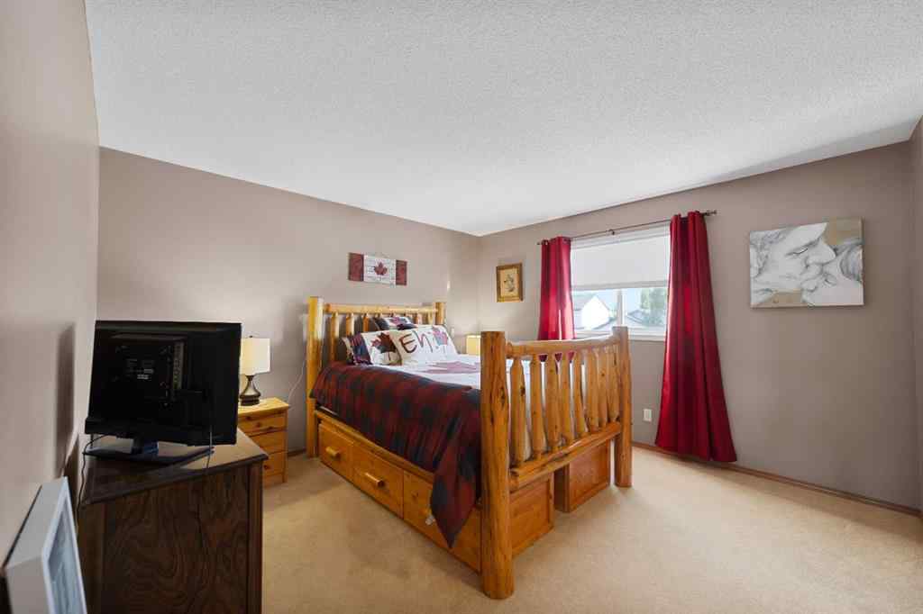 MLS® A2258063 - 424 Stonegate Road NW in Stonegate Airdrie, Residential