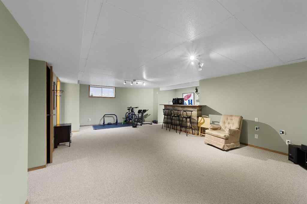 MLS® A2258063 - 424 Stonegate Road NW in Stonegate Airdrie, Residential