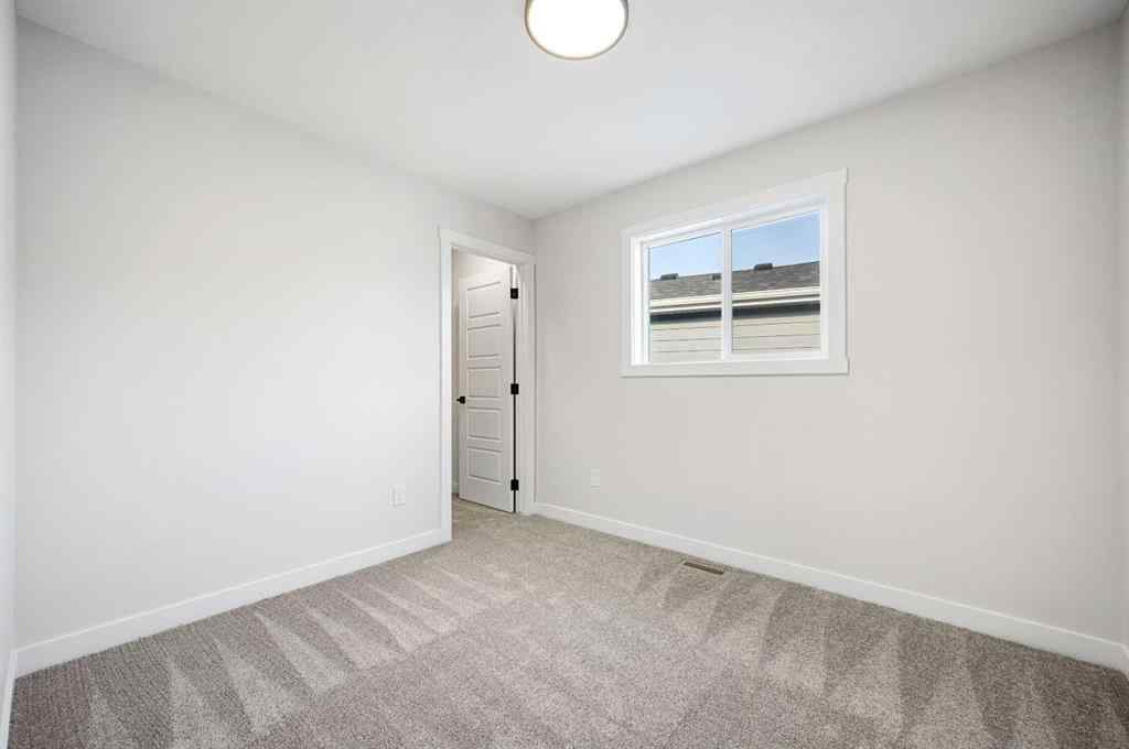 MLS® A2258079 - 91 Versant Way SW in Alpine Park Calgary, Residential