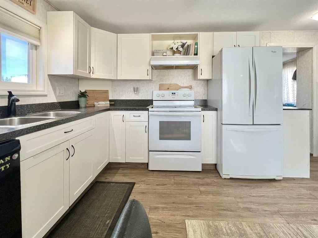 MLS® A2258081 - Unit #144 10615 88 Street  in MH - Trumpeter Village Grande Prairie, Mobile
