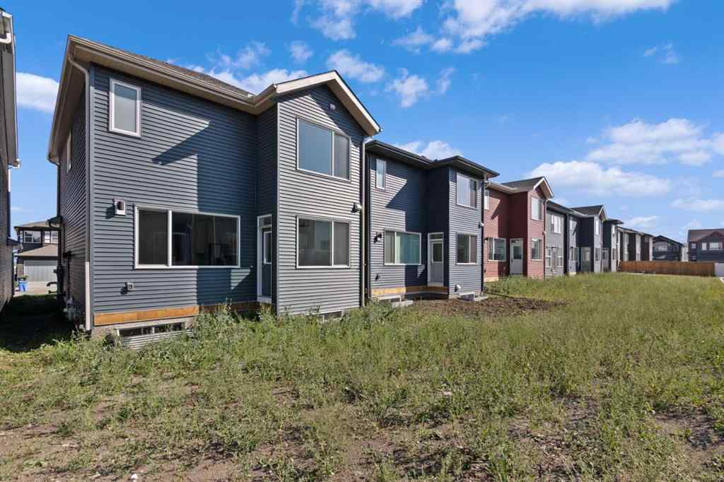 MLS® A2258100 - 121 Creekstone Landing SW in Pine Creek Calgary, Residential