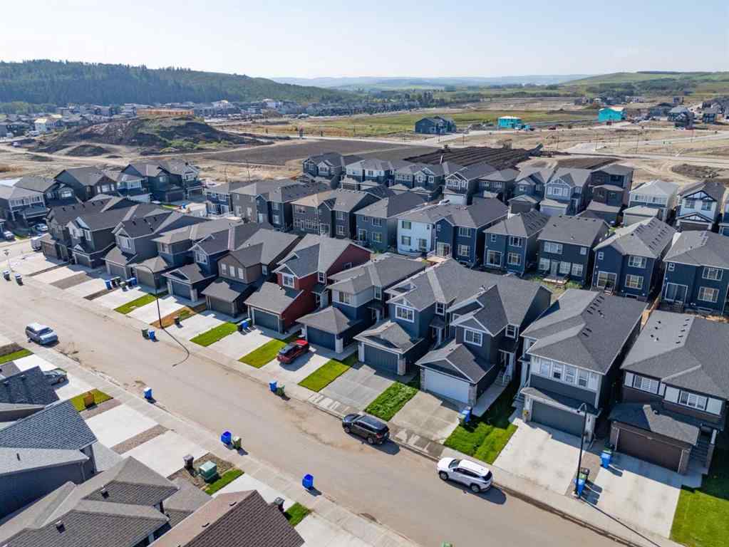 MLS® A2258100 - 121 Creekstone Landing SW in Pine Creek Calgary, Residential