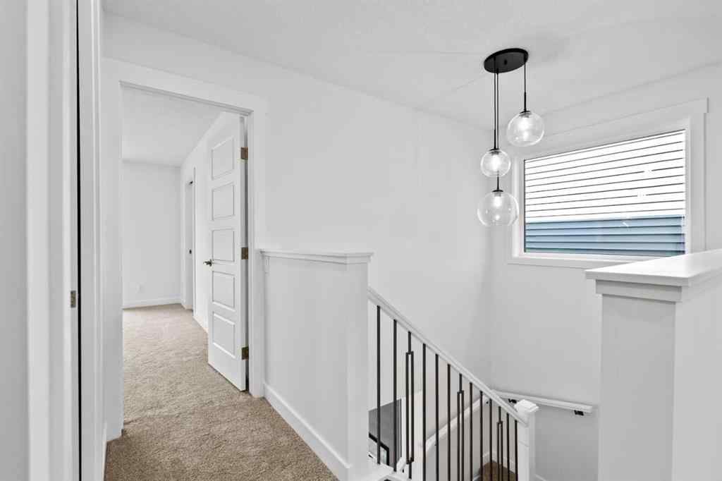 MLS® A2258100 - 121 Creekstone Landing SW in Pine Creek Calgary, Residential