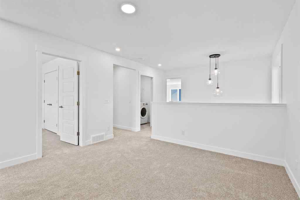 MLS® A2258100 - 121 Creekstone Landing SW in Pine Creek Calgary, Residential