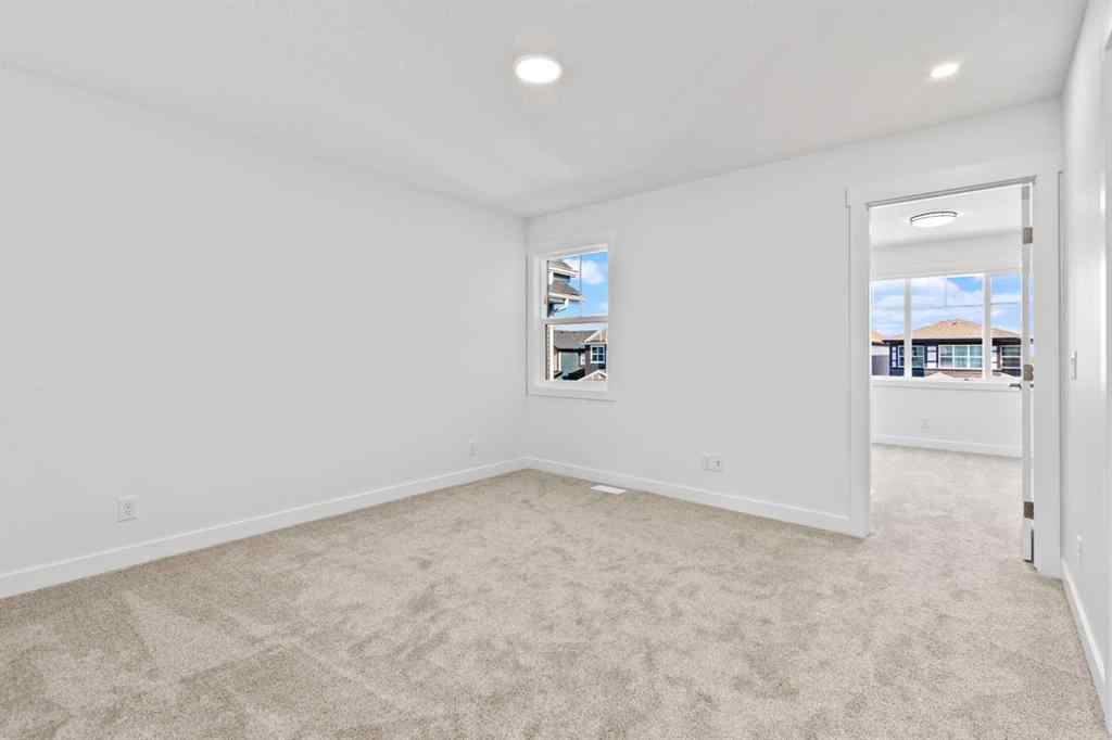 MLS® A2258100 - 121 Creekstone Landing SW in Pine Creek Calgary, Residential