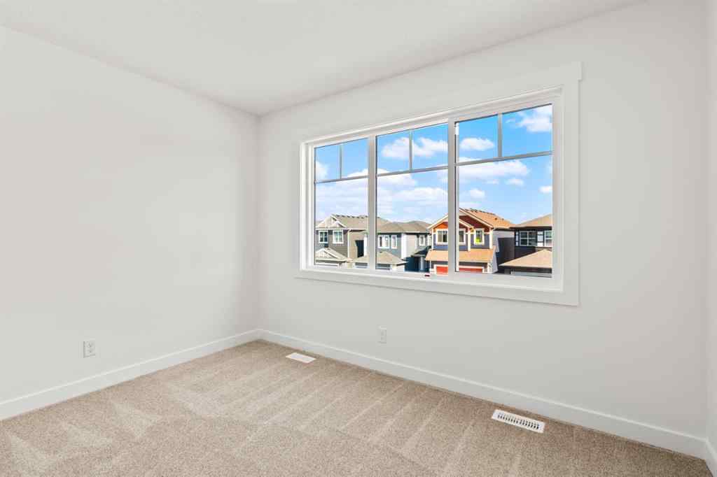 MLS® A2258100 - 121 Creekstone Landing SW in Pine Creek Calgary, Residential