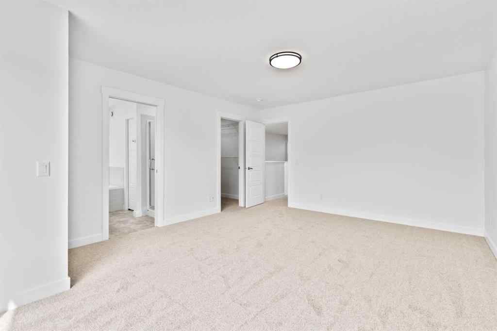 MLS® A2258100 - 121 Creekstone Landing SW in Pine Creek Calgary, Residential