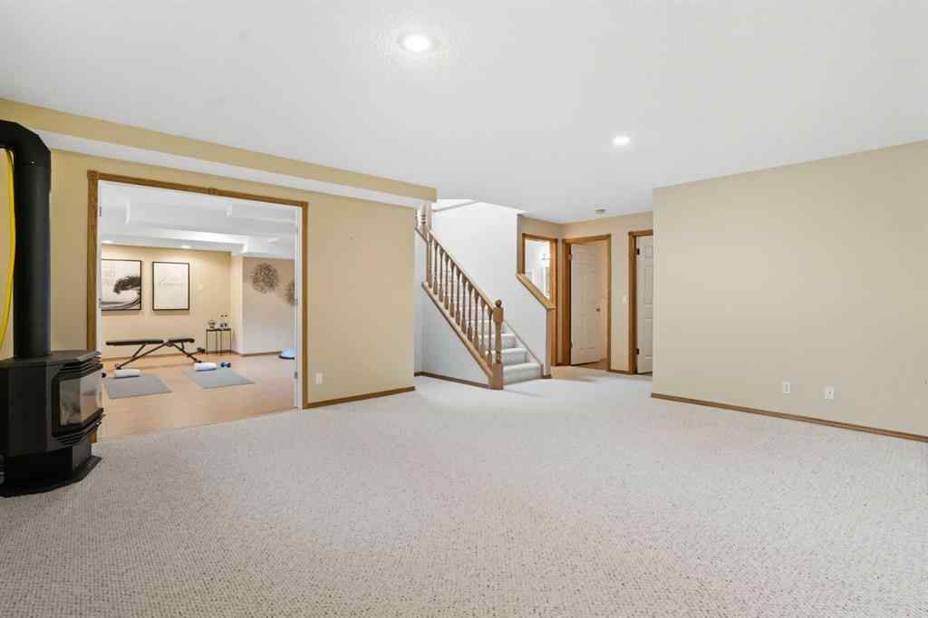 MLS® A2258102 - 12 Bow Way  in Bow Meadows Cochrane, Residential