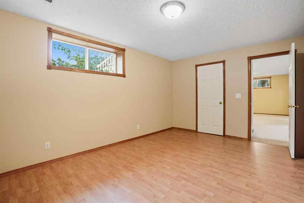 MLS® A2258102 - 12 Bow Way  in Bow Meadows Cochrane, Residential