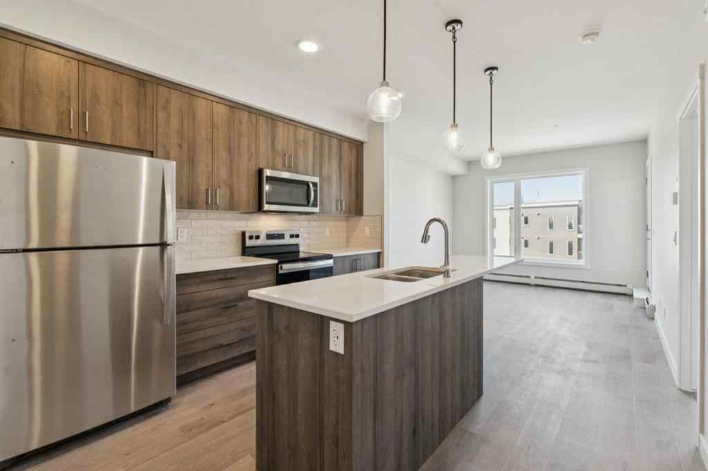 MLS® A2258121 - Unit #412 700 Shawnee Square SW in Shawnee Slopes Calgary, Residential