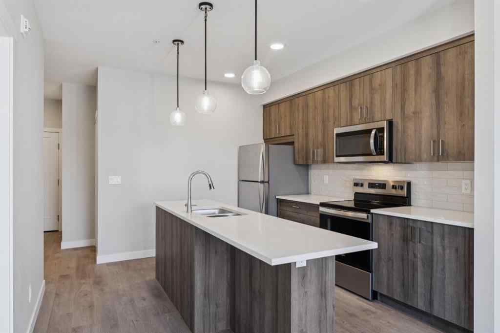 MLS® A2258121 - Unit #412 700 Shawnee Square SW in Shawnee Slopes Calgary, Residential
