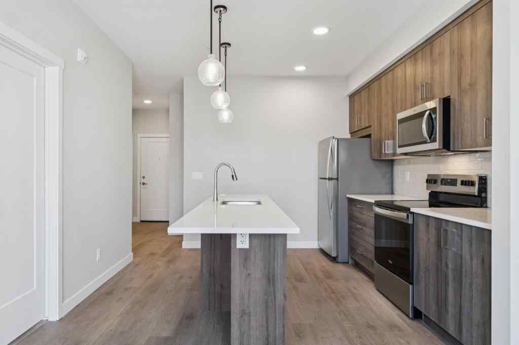 MLS® A2258121 - Unit #412 700 Shawnee Square SW in Shawnee Slopes Calgary, Residential