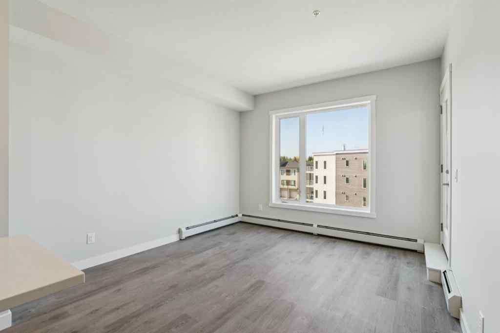 MLS® A2258121 - Unit #412 700 Shawnee Square SW in Shawnee Slopes Calgary, Residential