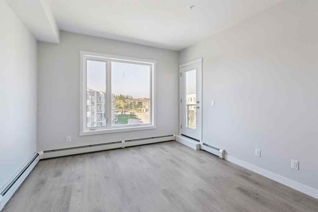 MLS® A2258121 - Unit #412 700 Shawnee Square SW in Shawnee Slopes Calgary, Residential