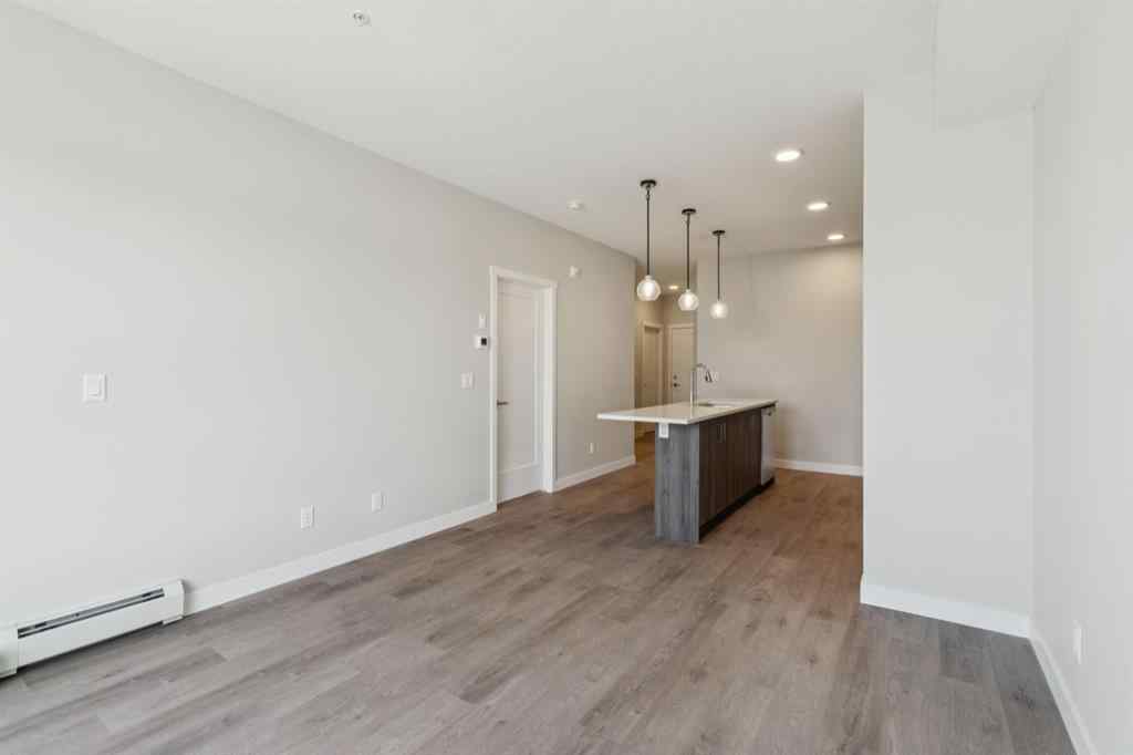 MLS® A2258121 - Unit #412 700 Shawnee Square SW in Shawnee Slopes Calgary, Residential