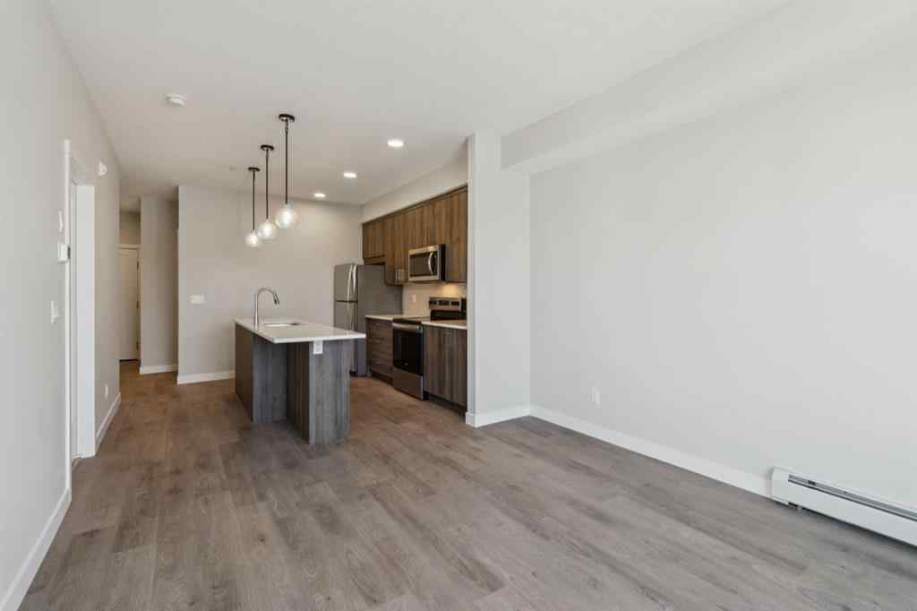 MLS® A2258121 - Unit #412 700 Shawnee Square SW in Shawnee Slopes Calgary, Residential