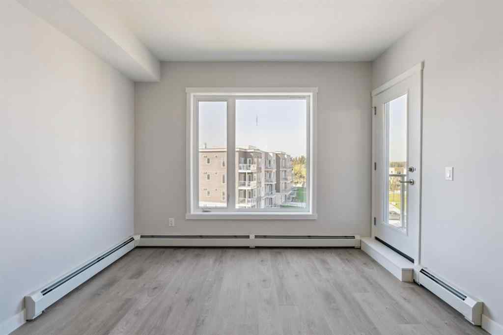 MLS® A2258121 - Unit #412 700 Shawnee Square SW in Shawnee Slopes Calgary, Residential
