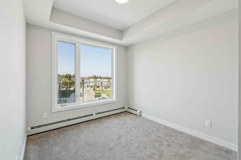 MLS® A2258121 - Unit #412 700 Shawnee Square SW in Shawnee Slopes Calgary, Residential