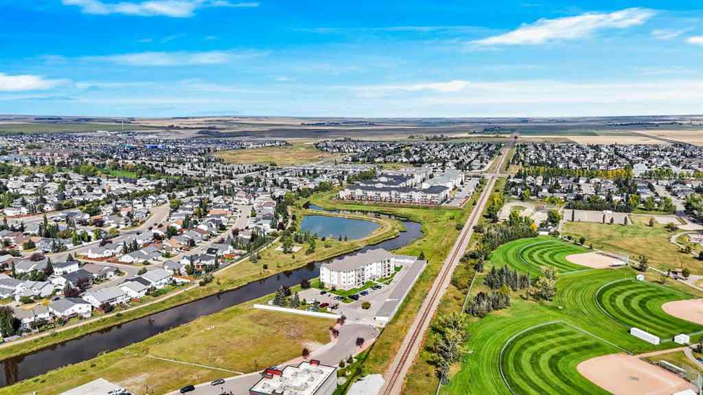 MLS® A2258126 - Unit #107 300 Edwards Way NW in Willowbrook Airdrie, Residential