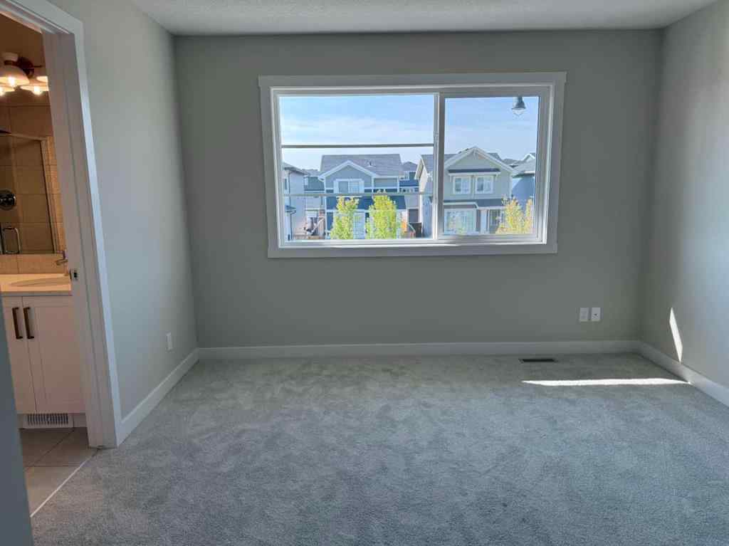 MLS® A2258128 - 318 Sundown Road  in Sunset Ridge Cochrane, Residential