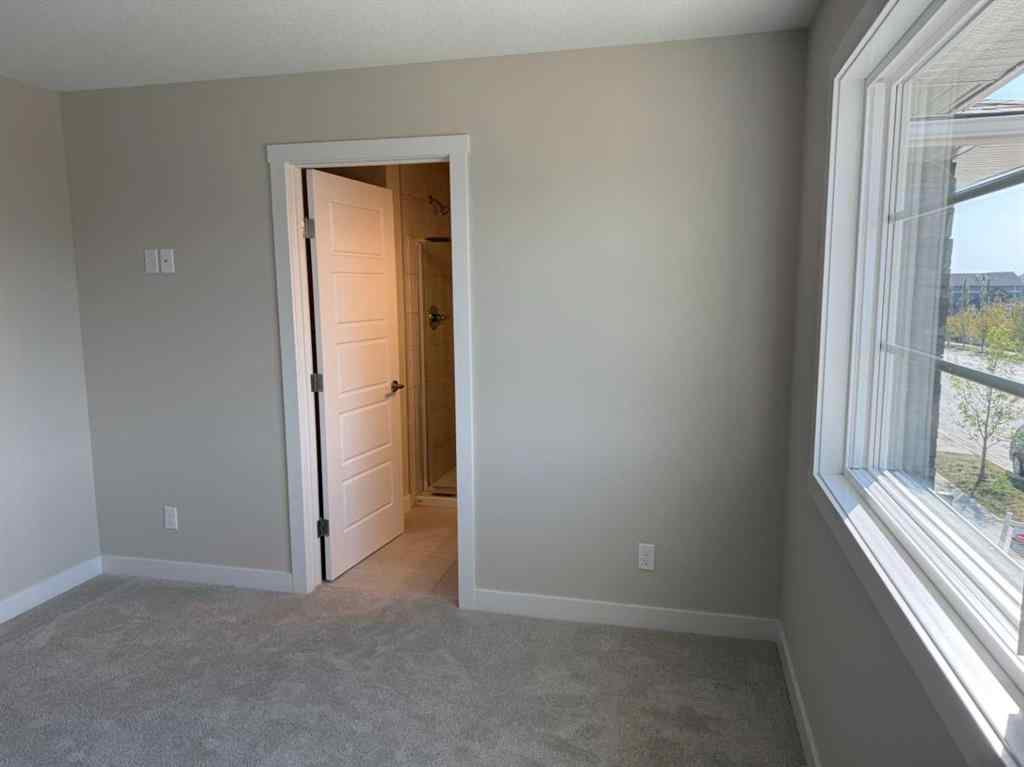MLS® A2258128 - 318 Sundown Road  in Sunset Ridge Cochrane, Residential